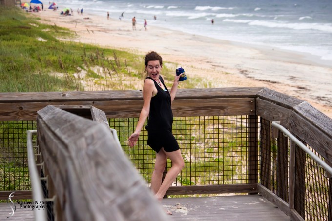 Amy on the boardwalk to the beach
