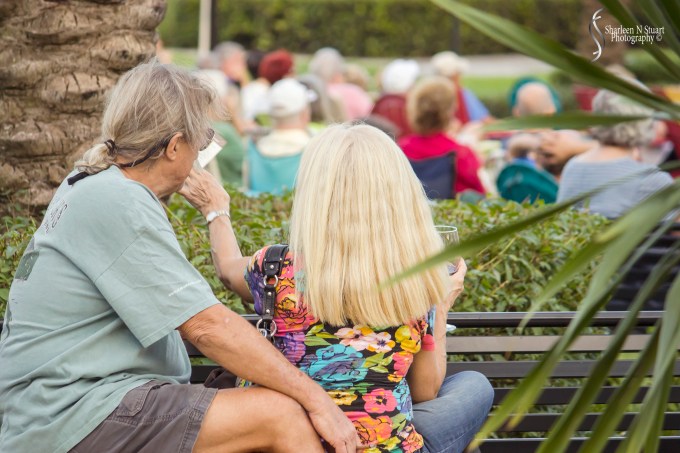 The rotating bench. Yet another couple enjoying the music.