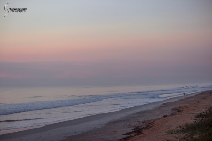 Sunrise stroll along the beach
