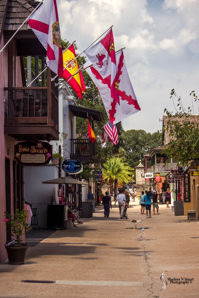 A walk through the Old City in St Augustine. Always a favorite past time of mine. This day followed a weekend of celebration the first landing in St Augustine. Flags decked the buildings, lamp posts were wrapped in decorative banners. The shopkeepers said the weekend had been hectic. So glad we came through on the Wednesday.