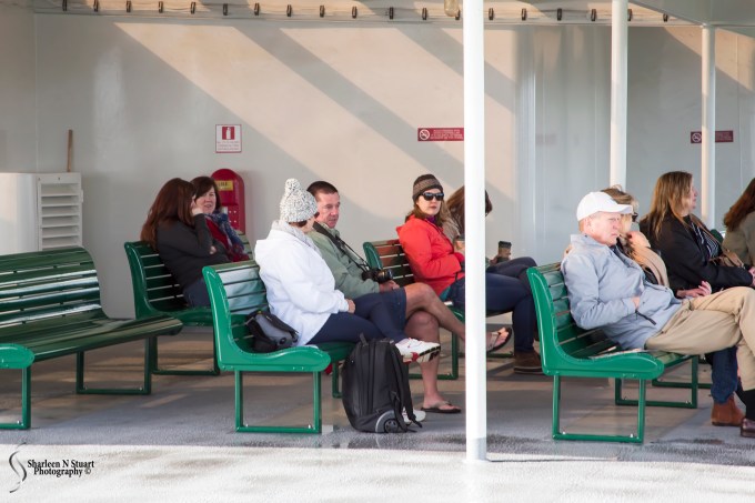 This is so Richard - everyone is dressed for the middle of winter and he has shorts and flip flops.