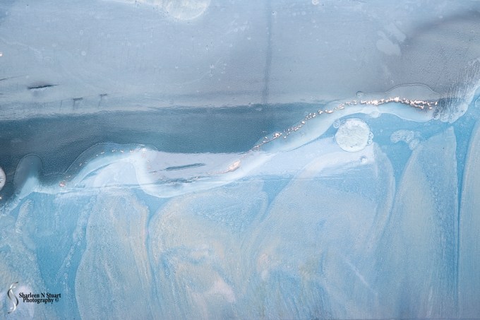 Rickloweart.com These pieces of work were painted on canvas and covered with a number of layers of resin. The effect was stunning.