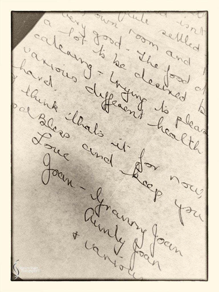 A close-up of handwritten notes on a piece of paper, featuring thoughts and wishes from someone named Joan, expressing care and concern for another individual.